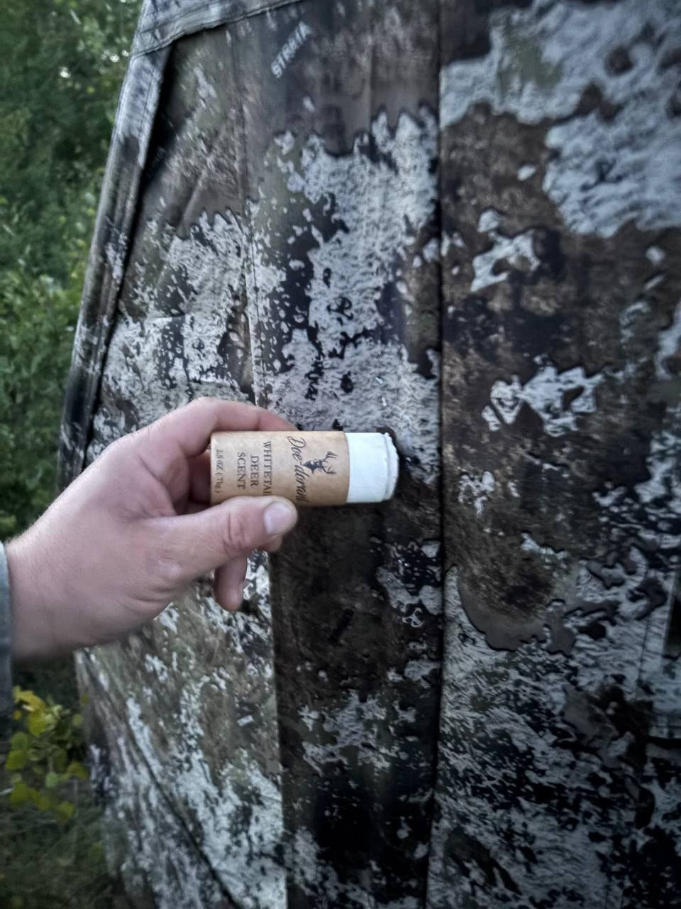 Deer scent stick applied to Blind